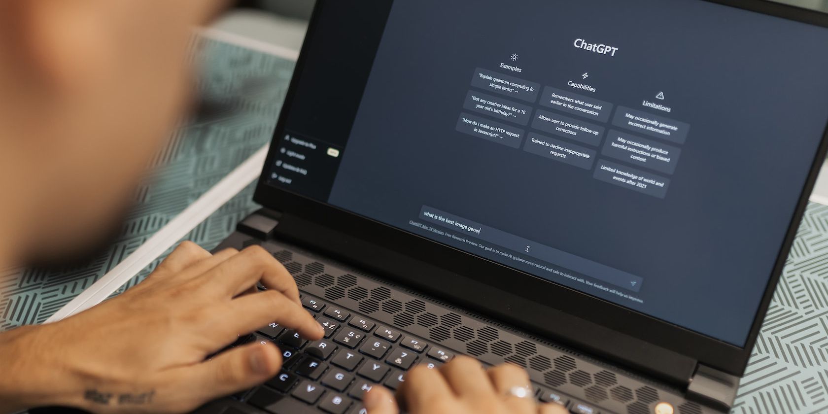 Picture showing person typing a ChatGPT prompt