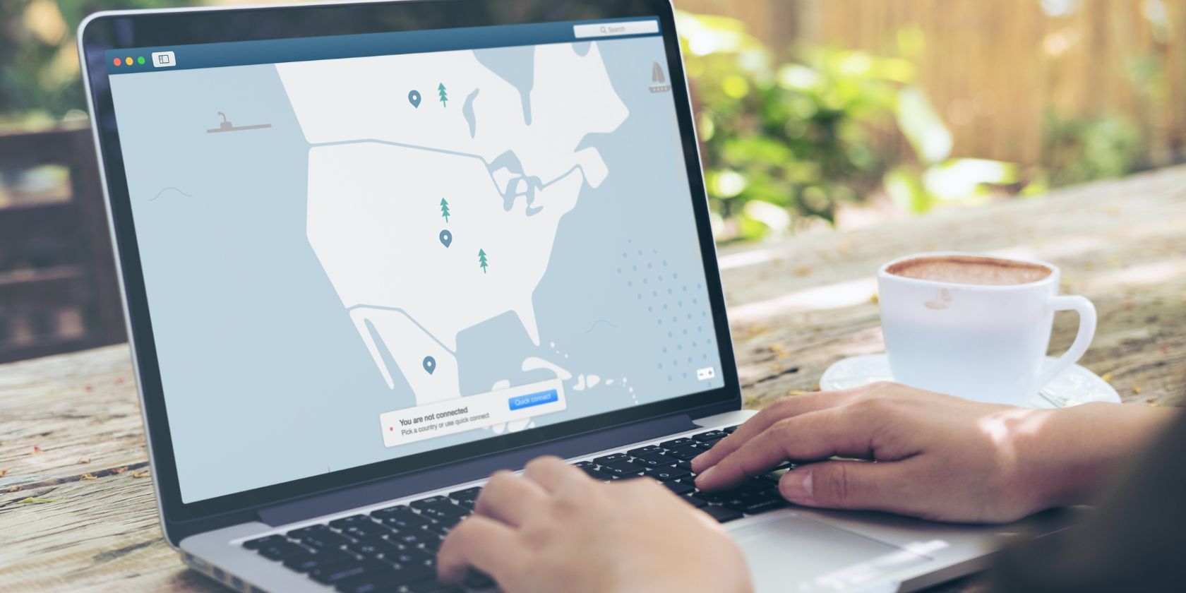 person using vpn on laptop outside