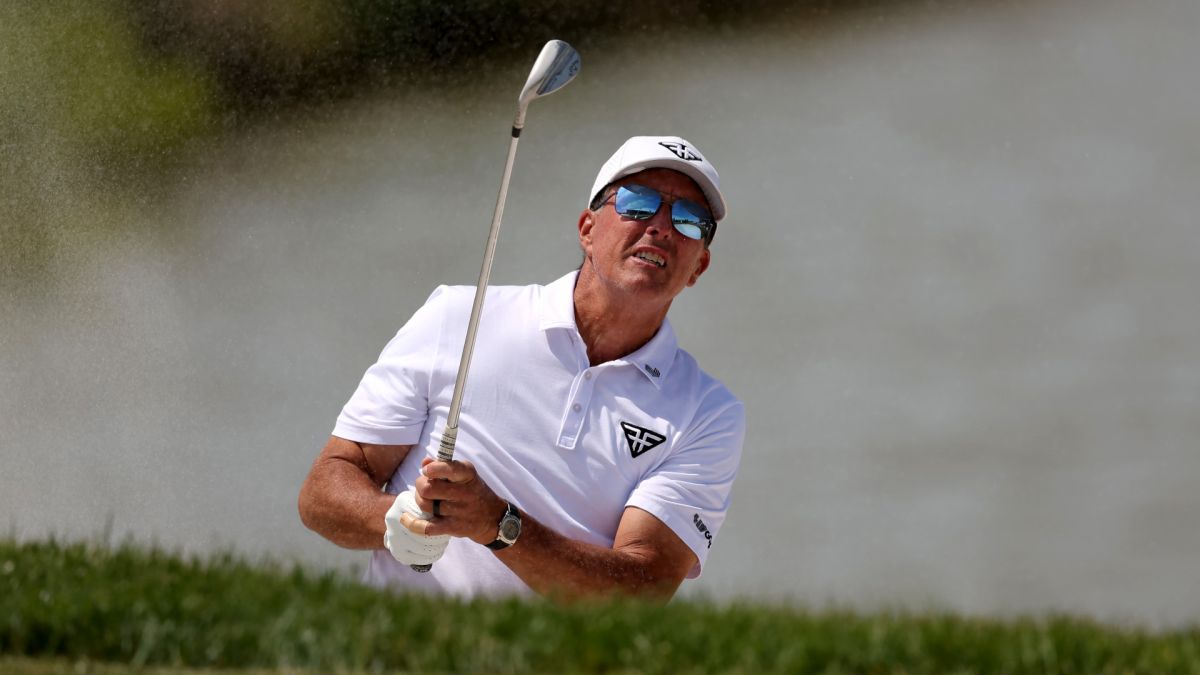 Phil Mickelson hits out of the bunker